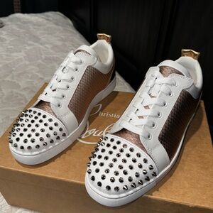 Christian Louboutin red bottoms 9.5